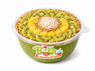 Green smoothie bowl with kiwi, mango, granola, and coconut