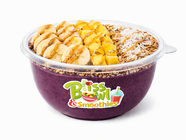 Bliss Bowl & Smoothies acai bowl with bananas, mango, granola